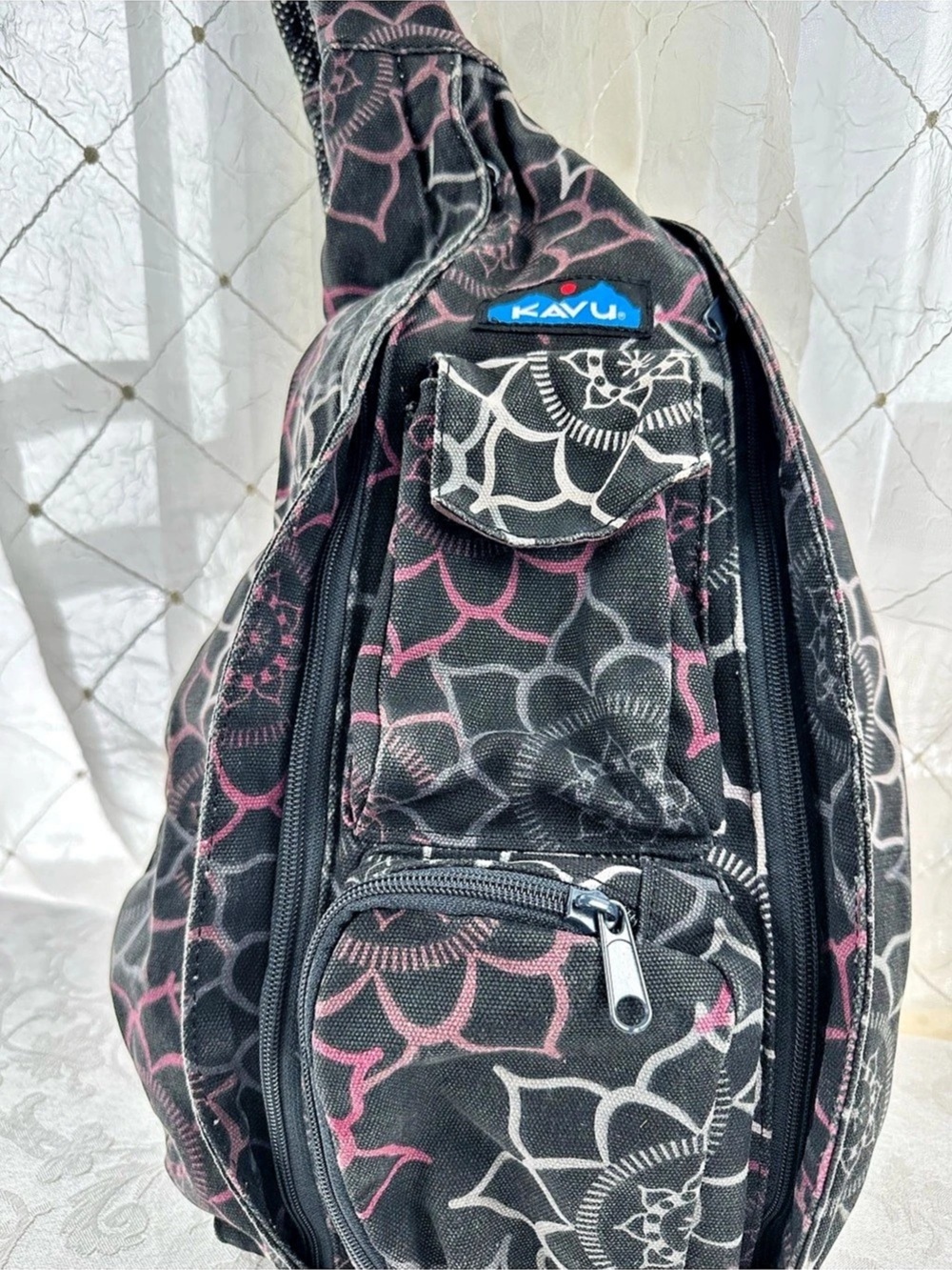 KAVU Original Rope Bag Floral Sling Backpack Black & Pink